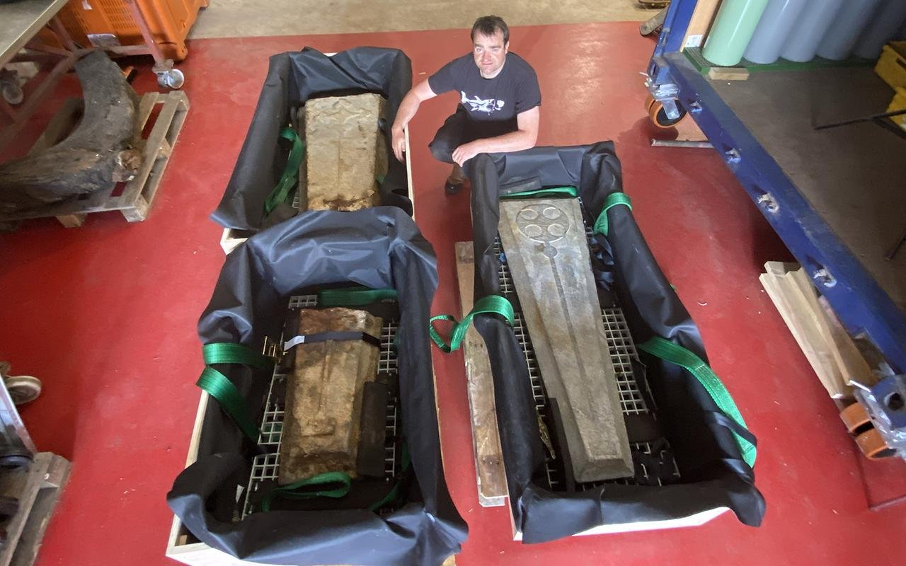 Medieval grave slabs recovered from 13th-century shipwreck