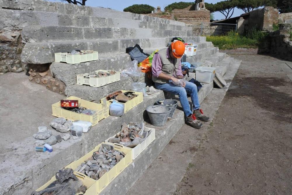 Archaeologists uncover trove of burnt bones and ritual artifacts in ancient Roman well near Rome